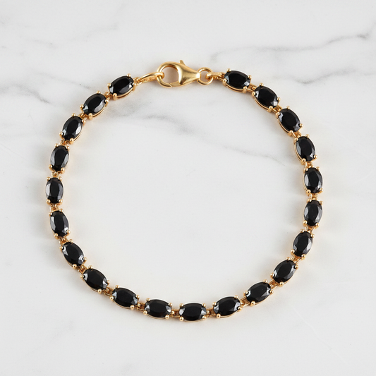 Black Spinel Tennis Bracelet on White Marble