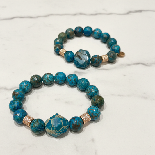 Blue Imperial Jasper Bracelets on White Marble